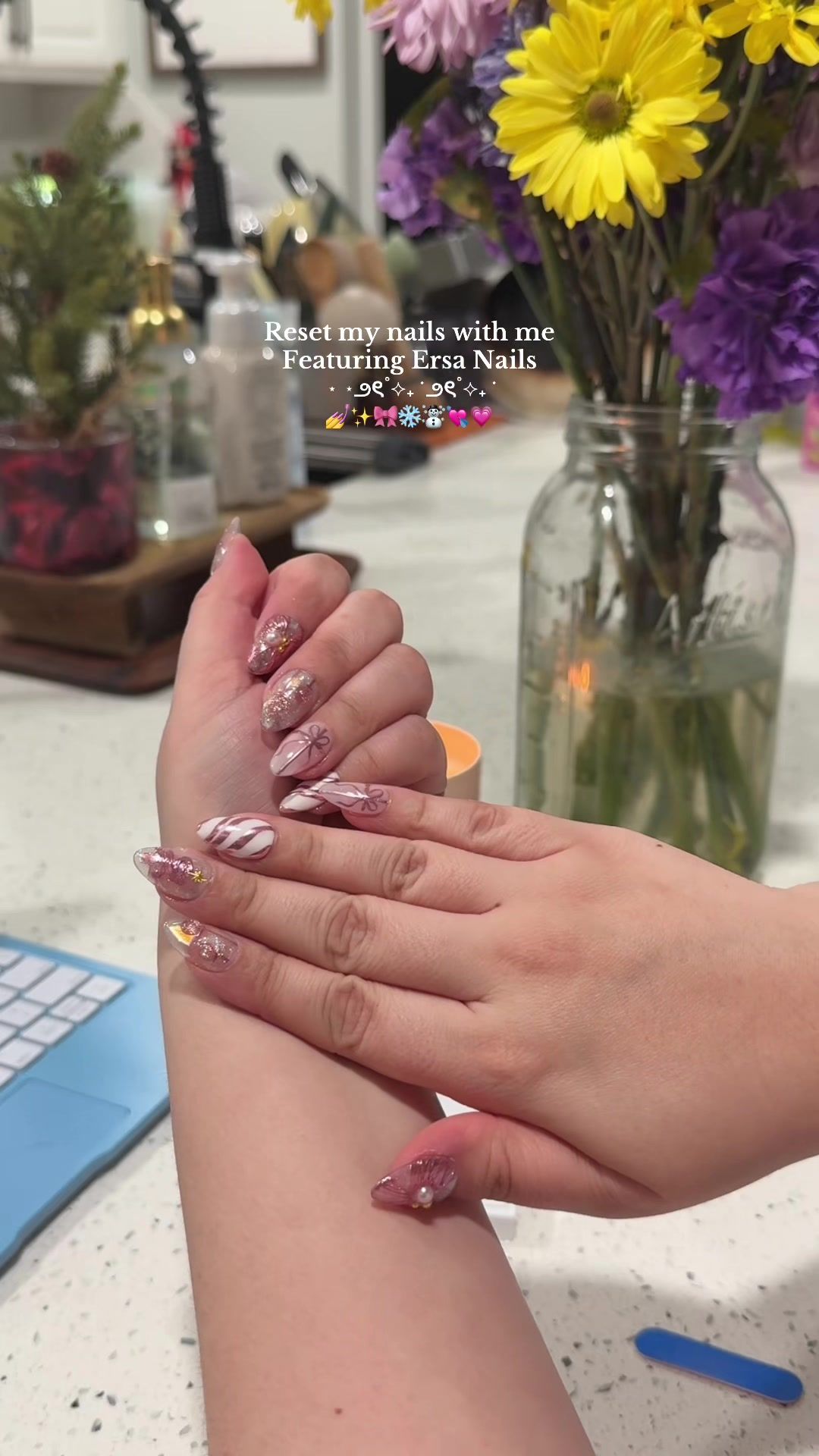 TikTok post by @joyceepixiiee for Ersa Nails. Caption reads: [...] nails are ready 🥂🍾✨☃️❄️🎀 thanks to @Ersa....