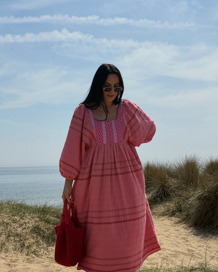 Instagram post by an influencer for NET-A-PORTER. Caption reads: PSA - Dress season officially opens this Thursday....