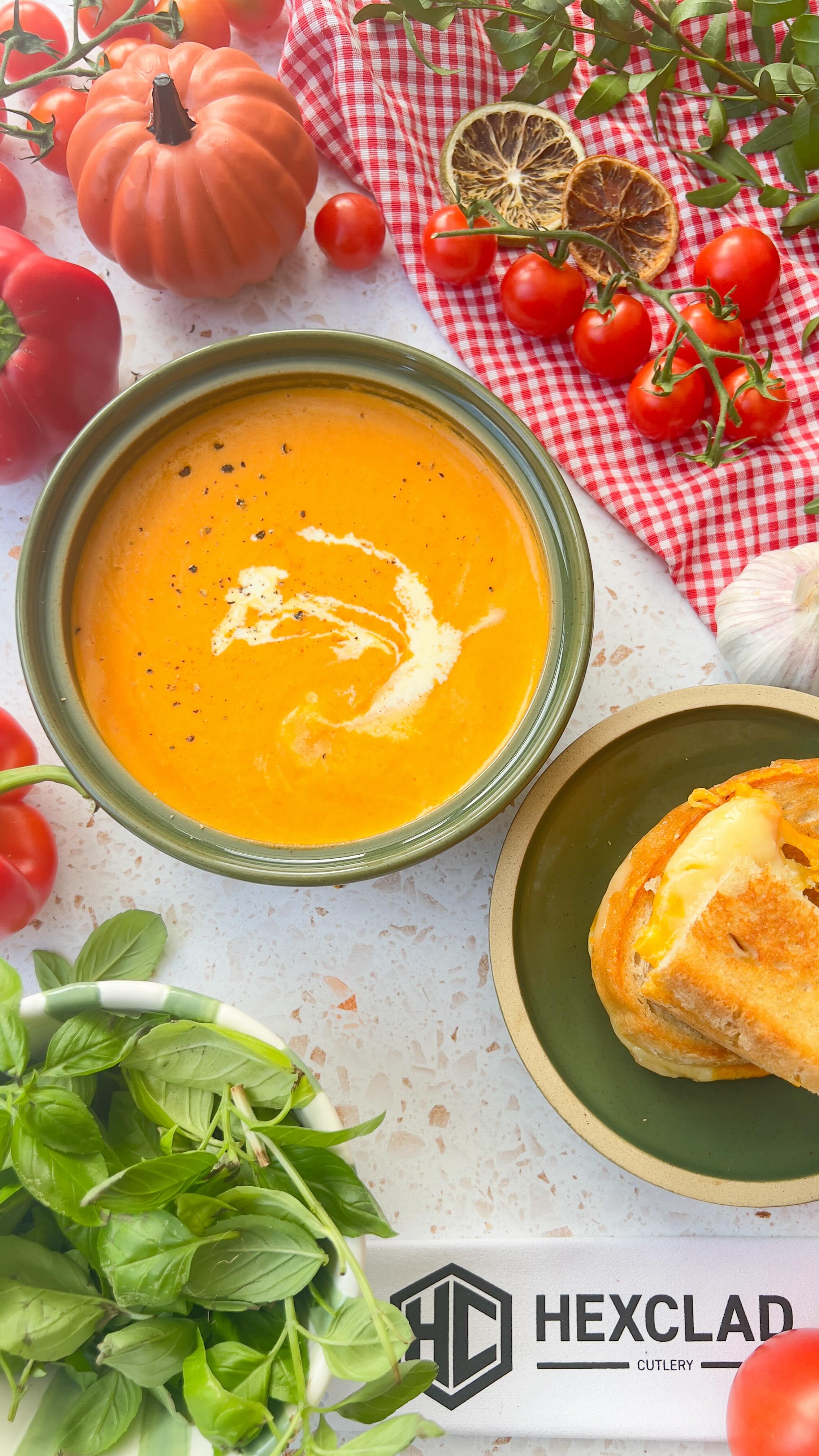 Instagram post by @mycomfortbakes for HexClad. Caption reads: Ad Roasted tomato soup and grilled cheese with....