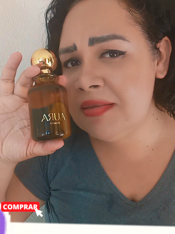 TikTok post by @rosa_beautycreator for Aura Beauty Club. Caption reads: [...] #aurabeauty #perfume #Beauty @Aura Beauty....