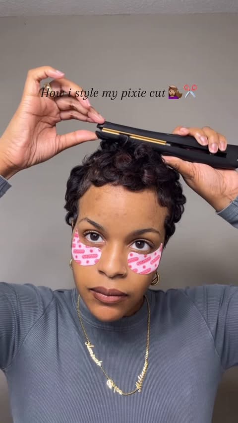 Instagram post by @bosslady__carla for TOPICALS. Caption reads: [...] my pixie cut 💇🏽‍♀️✂️

@redbykiss Flat iron....