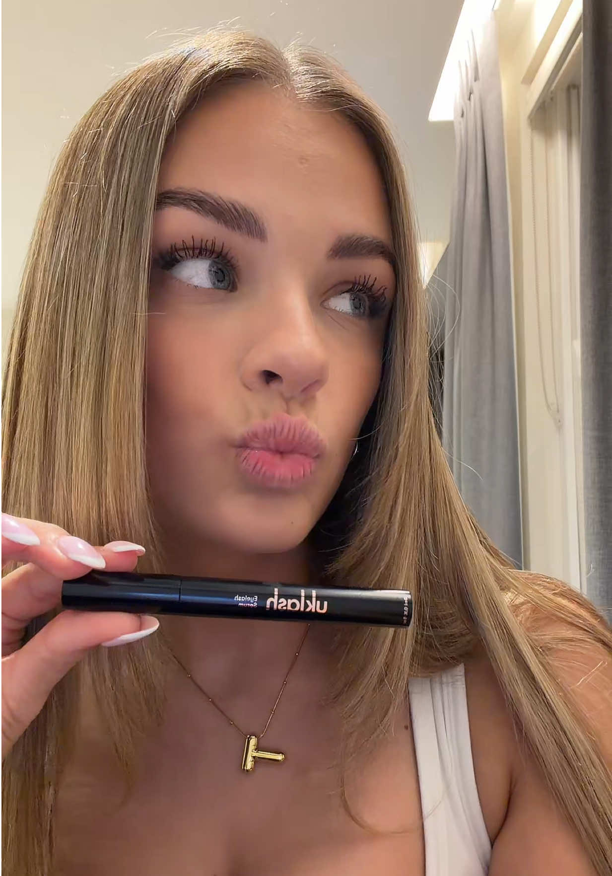 TikTok post by @tallulahmetcalfe3 for UKLASH. Caption reads: My go-to step in my routine always! From @UKLASH -....