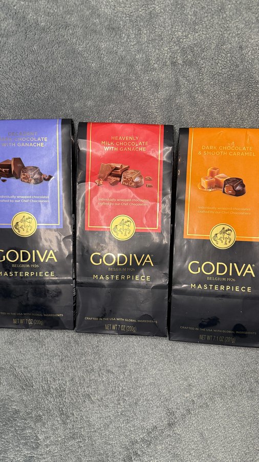 Instagram post by @markie_devo for Godiva. Caption reads: Taste testing the new Godiva Masterpiece....