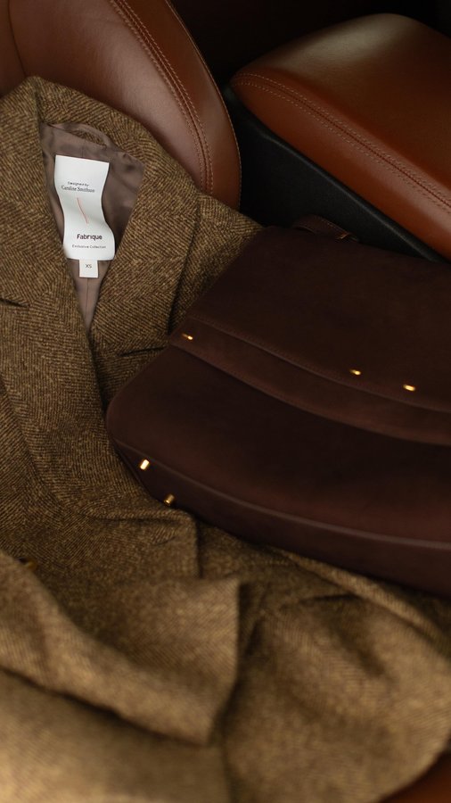 Instagram post by @ashleydianeevans for Fabrique. Caption reads: the most beautiful and practical work bag from....