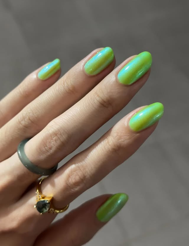 Instagram post by @natttynails for Caitlyn Minimalist. Caption reads: Obsessed w washed out neons like this!! ☃️☃️....