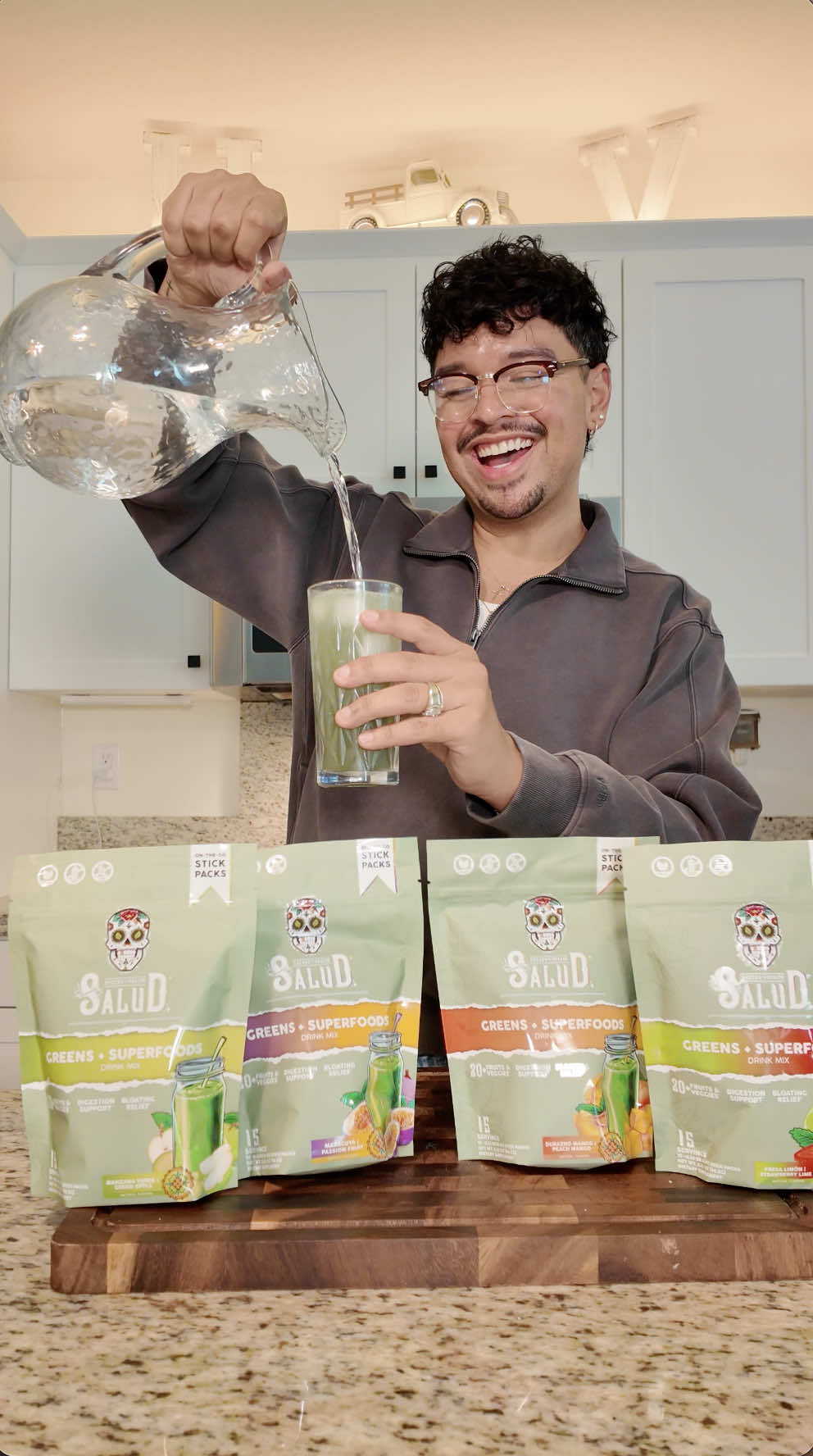 TikTok post by @thealantimoteov for Taste Salud. Caption reads: *whispers* @Taste Salud greens+superfoods is....