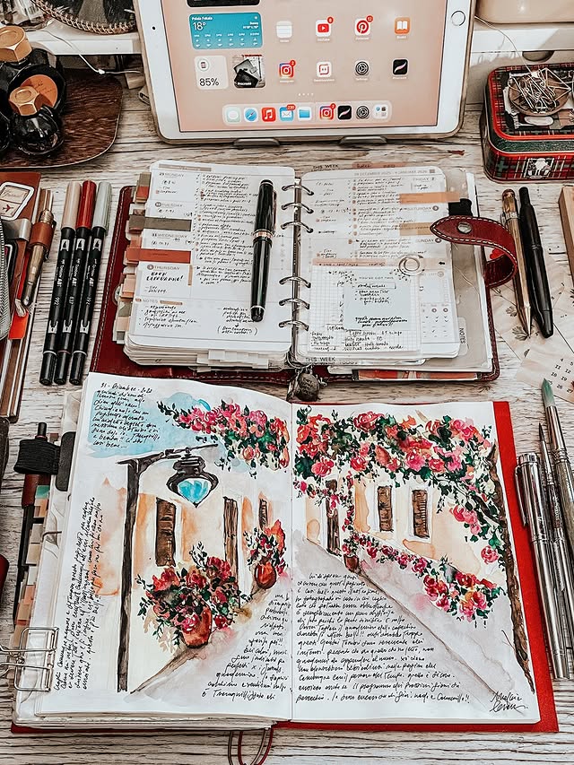 Instagram post by @marsiabramucci for Filofax. Caption reads: Previous week art journal spread, weekly pages,....