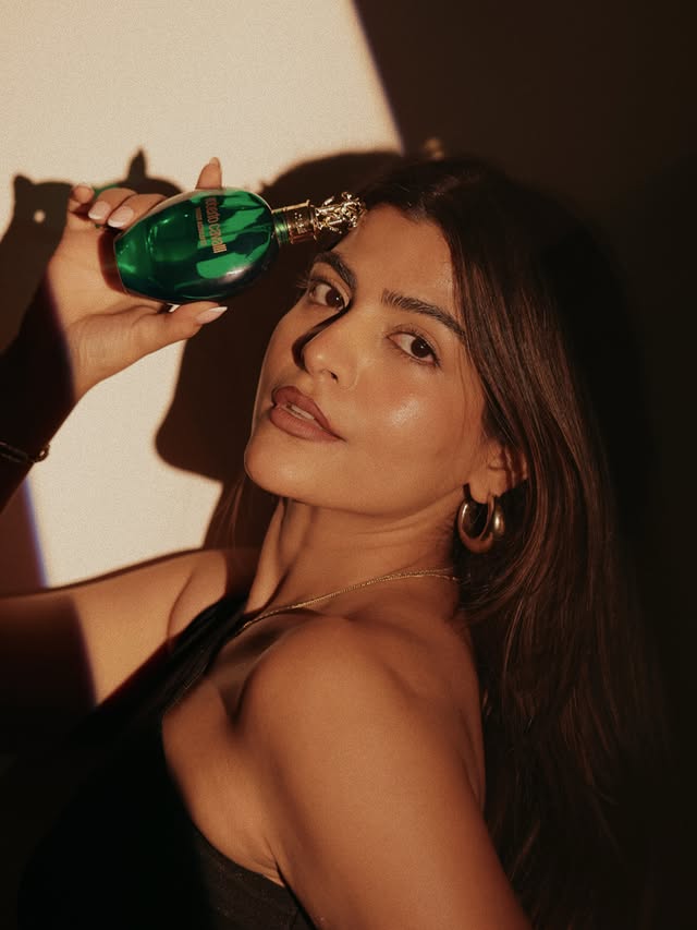 Instagram post by @thatbohogirl for Roberto Cavalli. Caption reads: [...] vibe.🥰 Safe to say, I’m obsessed.✨....