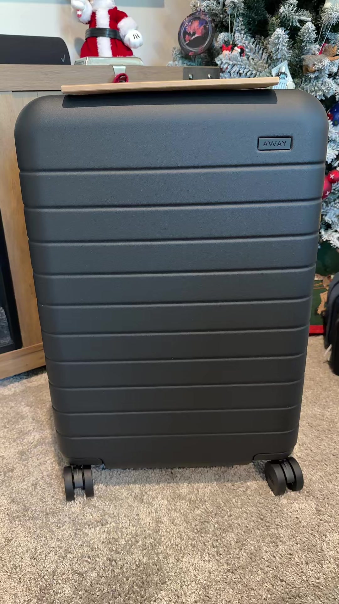 TikTok post by @chrispa46 for Away. Caption reads: Bigger Carry On Flex by @Away Travel is my new go....