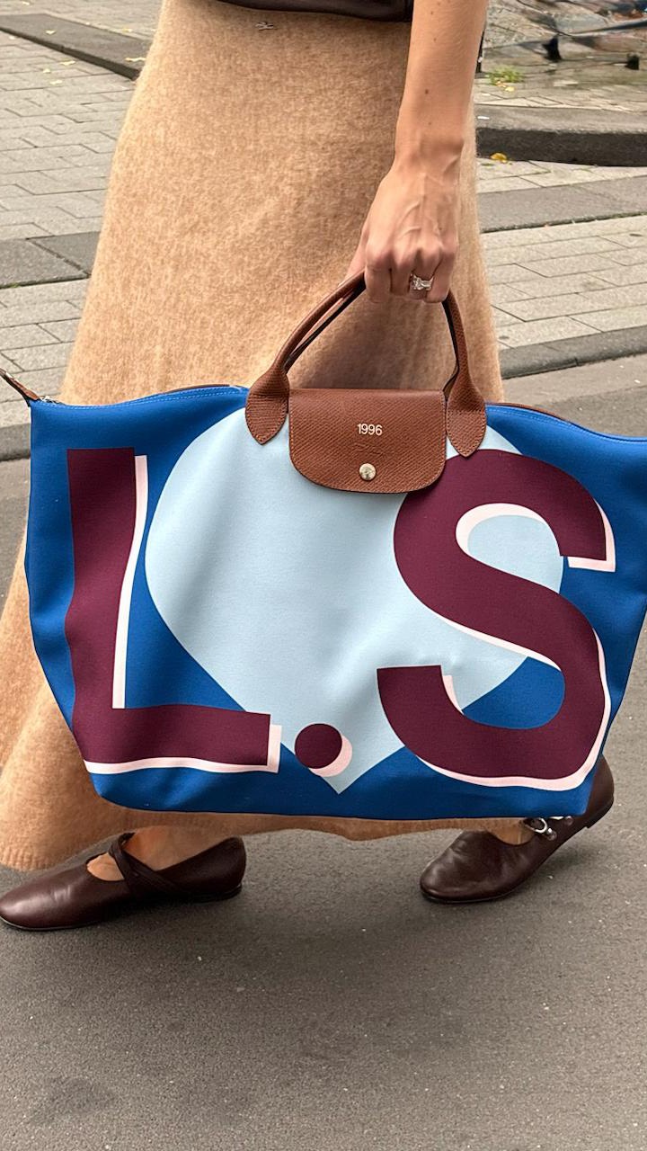 Instagram post by @holylora for Longchamp. Caption reads: not just any bag — MY bag🥹 „MyPliage“ to be....