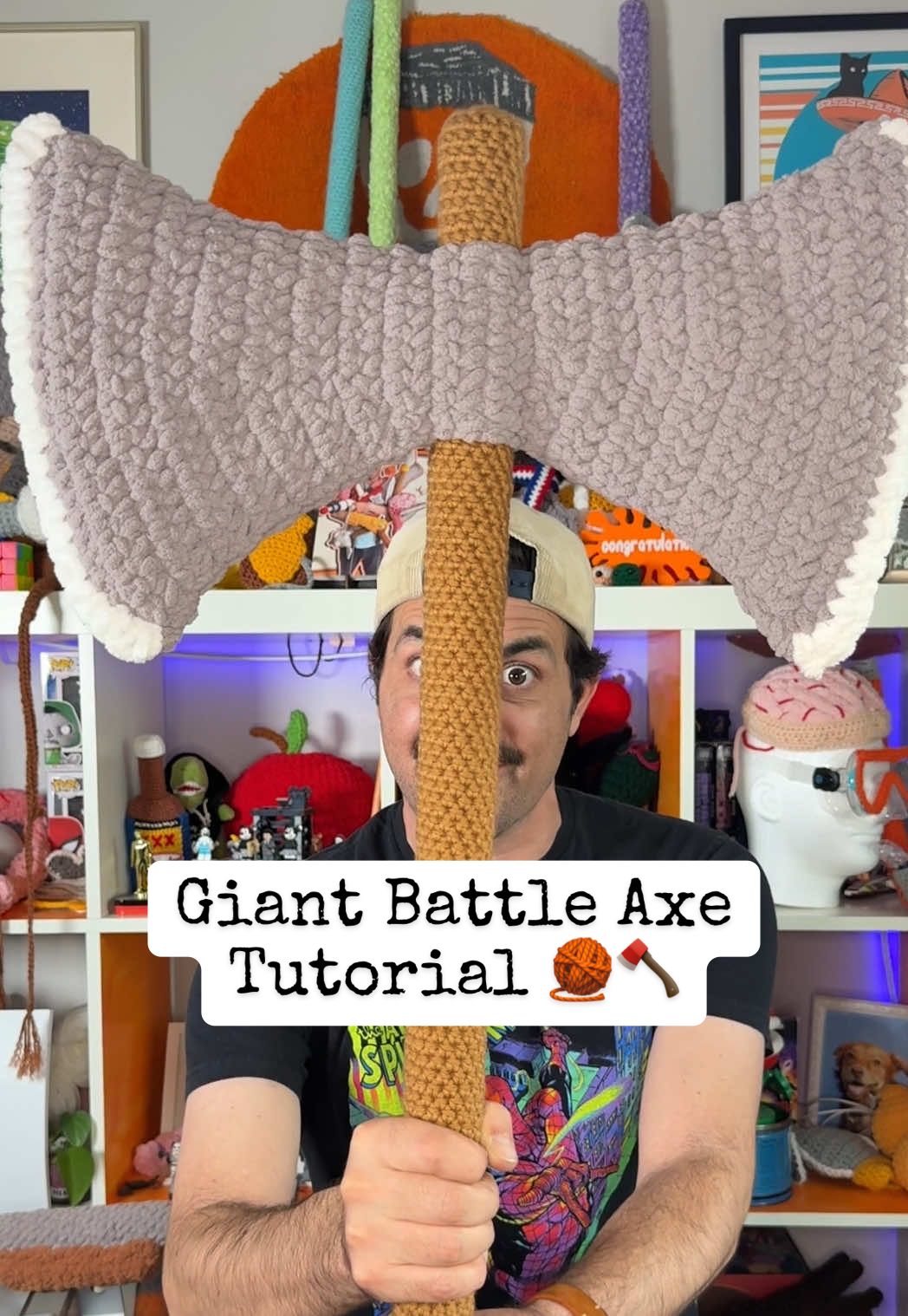 TikTok post by @the.cro.bro for Crochet. Caption reads: Giant Battle Axe Tutorial Swinging In!! 🧶🪓 🚨....