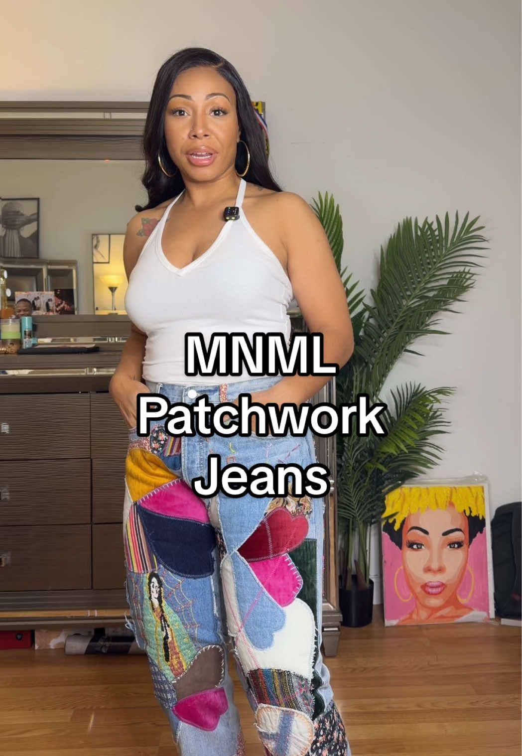 TikTok post by @mz.thora for mnml. Caption reads: These @mnml patchwork jeans are so fire!!!....