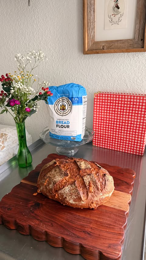 Instagram post by @sarahdoessourdough for King Arthur Baking Company. Caption reads: BANQUET BREAD (parmesan black pepper sourdough)....