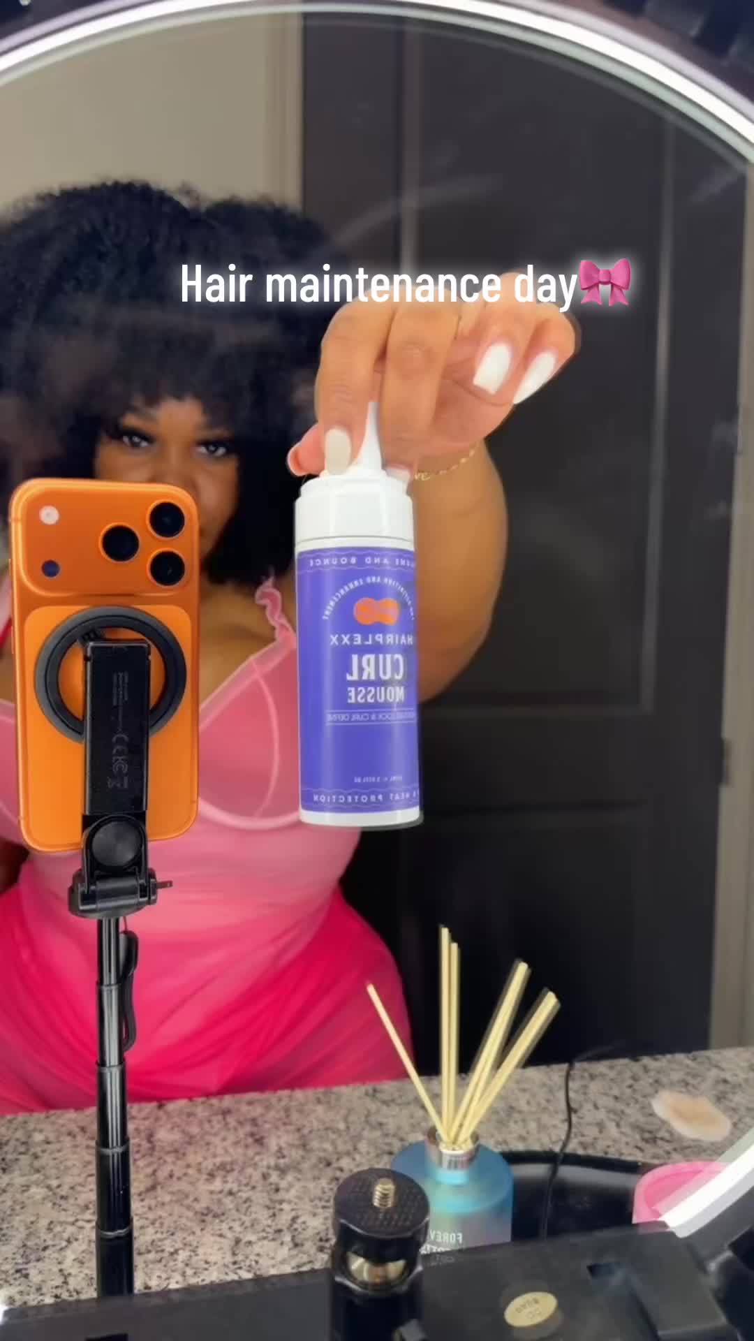TikTok post by @baby_de_yisus for Hairplexx Beauty. Caption reads: Defined curls powered by @Hairplexx Beauty Curling....