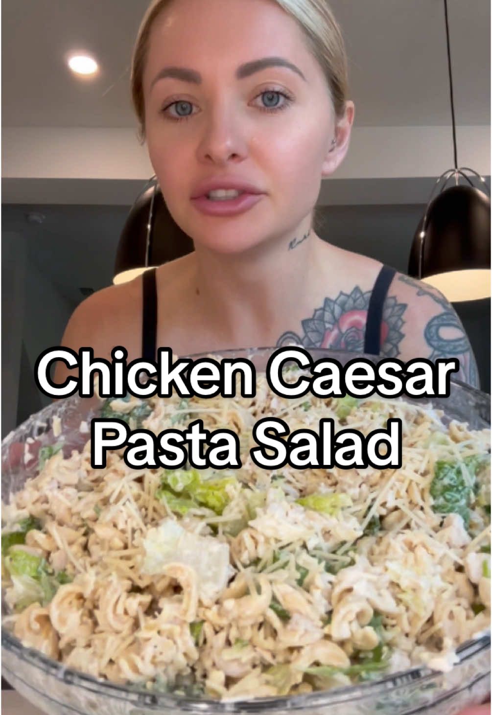 TikTok post by @trainwithshay for Kaizen Food Company. Caption reads: My viral chicken Caesar pasta salad but with....