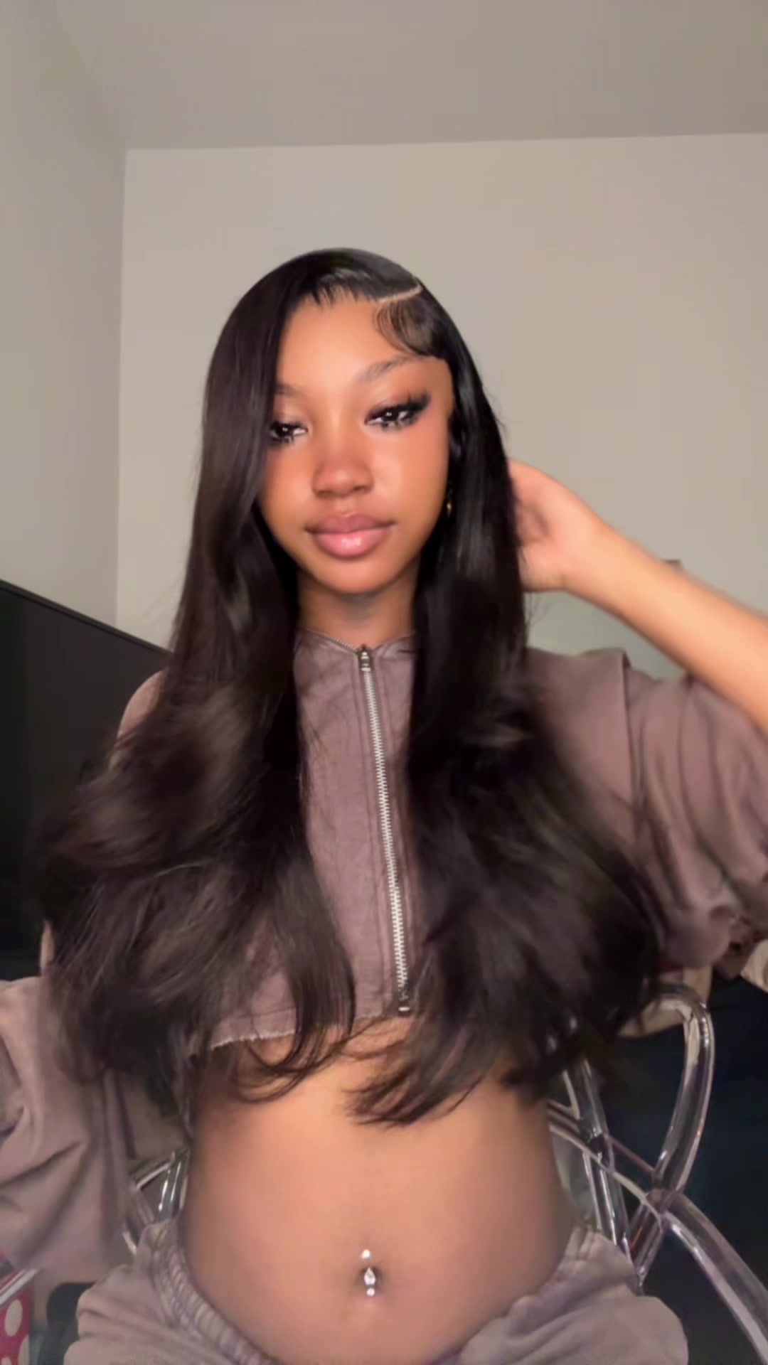 TikTok post by @.raychanell for Pizazz Hair. Caption reads: [...] + soft curls bad lately 😍 wig from @Pizazz....