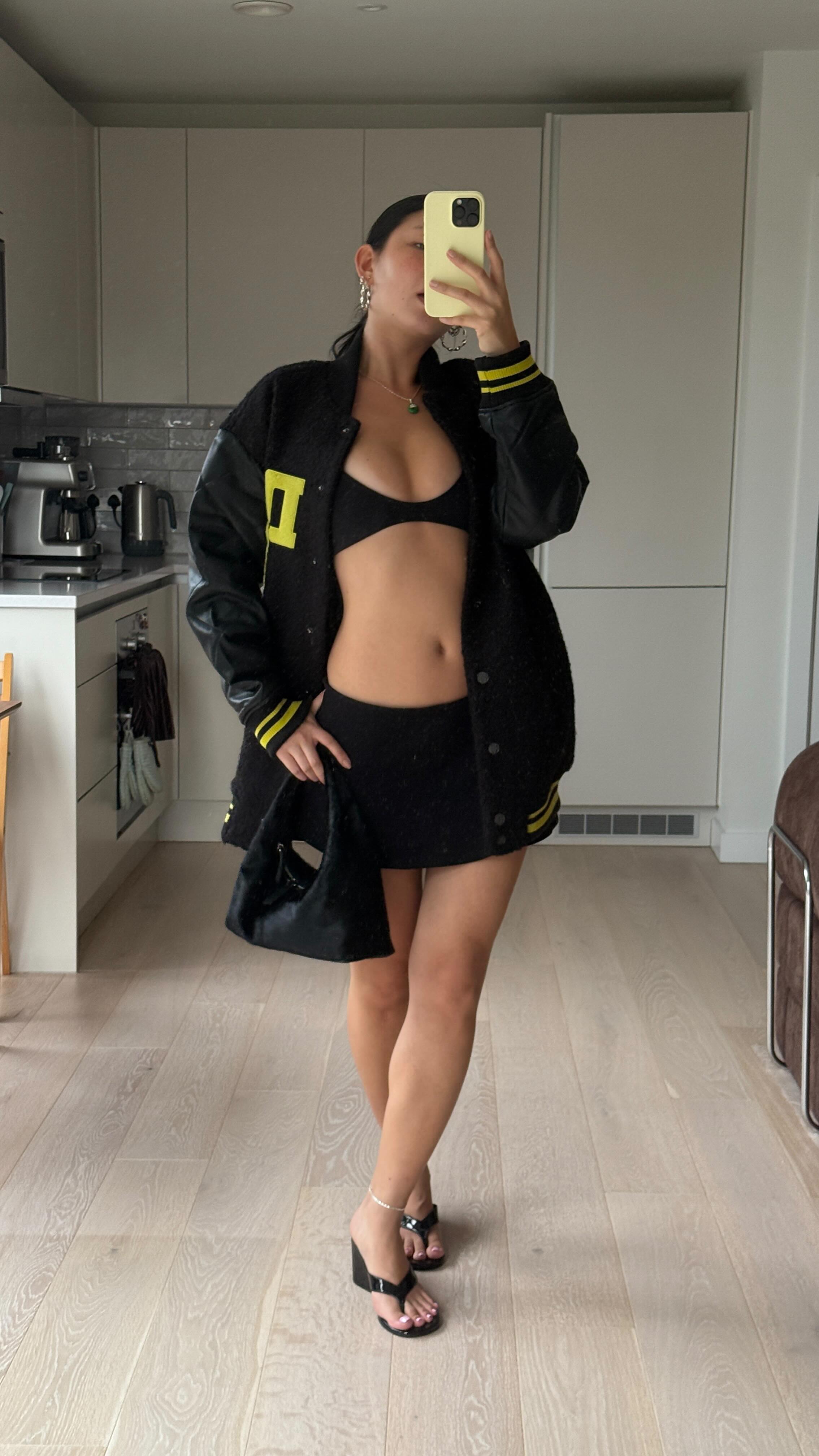 Instagram post by @tzefits for DKNY. Caption reads: influenced by miss @haileybieber , how i’d style....