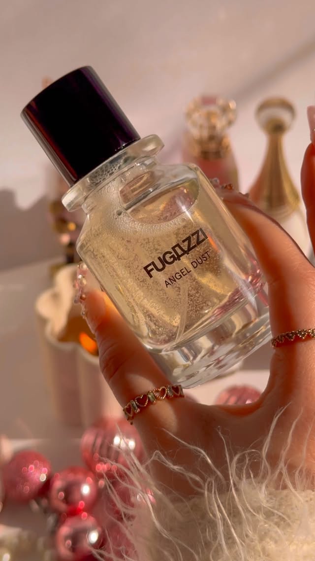 Instagram post by @thebeautyloverl for FUGAZZI Fragrances. Caption reads: Fugazzi Angel Dust Extrait ✨🪽 This is such a....