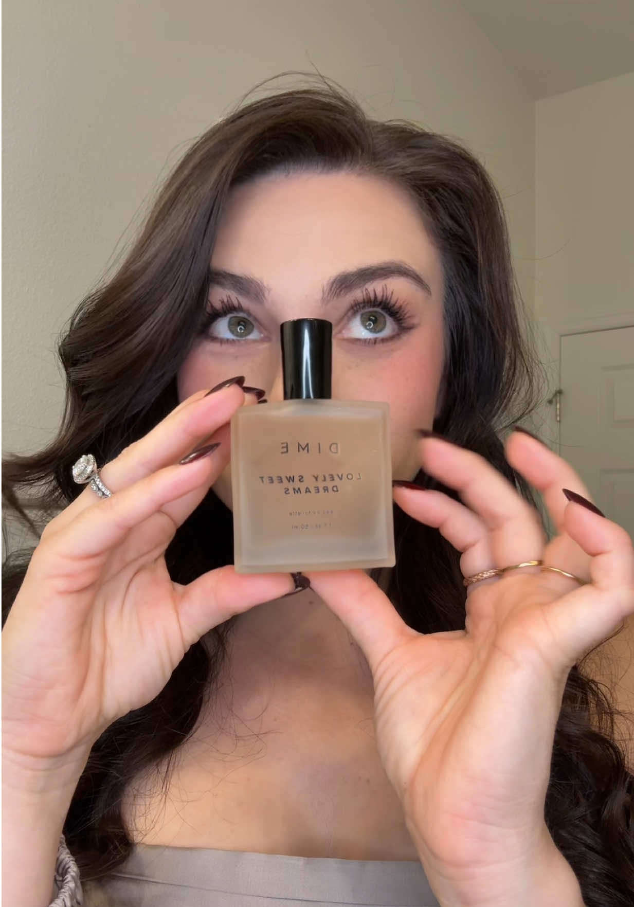 TikTok post by @chelella for DIME Beauty. Caption reads: This is probably my 10th @DIME Beauty order and my....