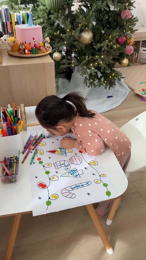 Instagram post by @winniekison for Crayola. Caption reads: comment “COLOR” for our large paper roll dispenser....