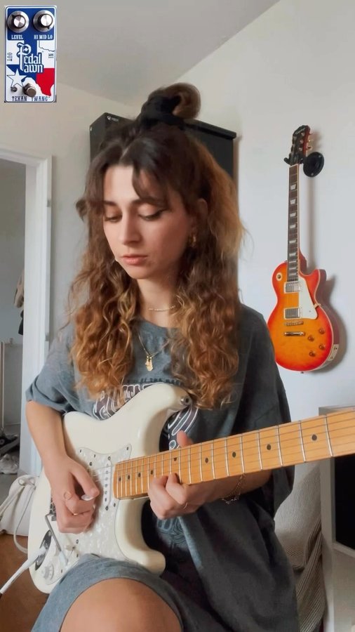 Instagram post by @songsofmeli for Pedal Pawn. Caption reads: trying some SRV with @pedalpawn Texan Twang....