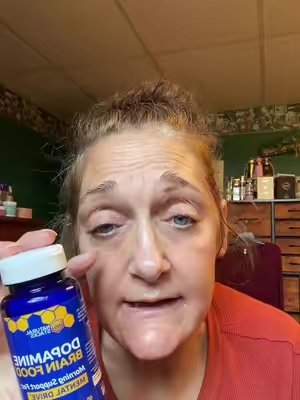 TikTok post by @skincaremomma03 for Natural Stacks. Caption reads: Dopamine and the brain. Meet Natural Stacks....