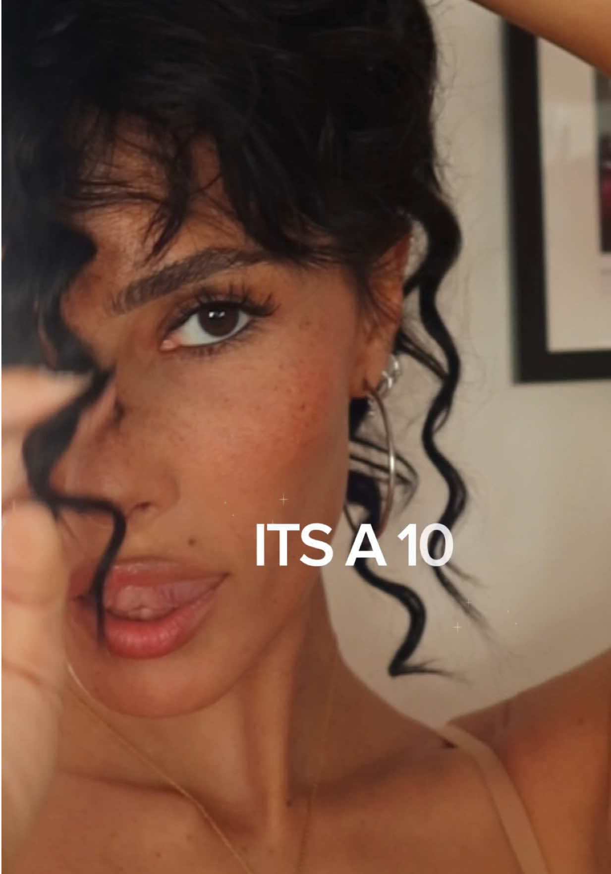 TikTok post by @lexiecoons for It's A 10 Haircare. Caption reads: my summer (and every season) savior @ItsA10....