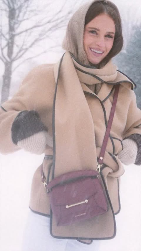 Instagram post by @victoria for Strathberry. Caption reads: [...] the Chicago snow in matching mini....