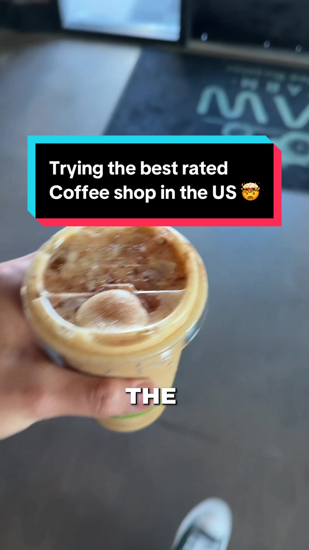 TikTok post by @realzack_ for Yelp. Caption reads: Trying the BEST rated coffee shop in the US BY....