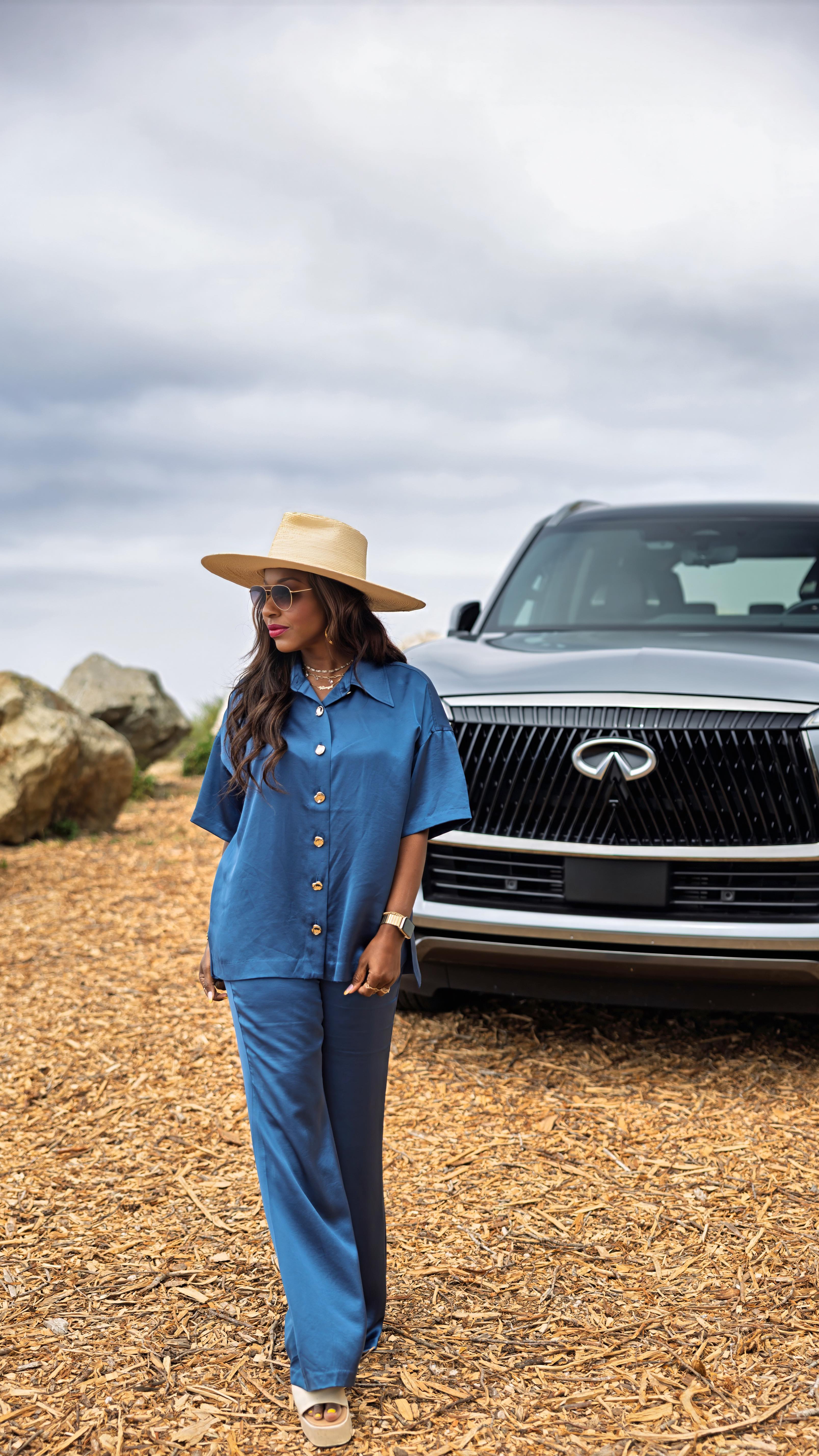 Instagram post by @kinyaclaiborne for INFINITI USA. Caption reads: From the breathtaking coastal roads of Big Sur in....