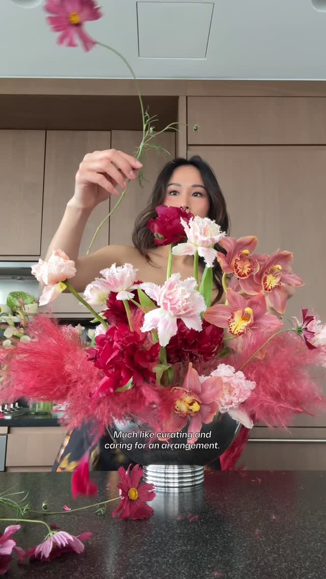 Instagram post by @isabeltan for The Laundress. Caption reads: [...] routine into a floral arrangement....