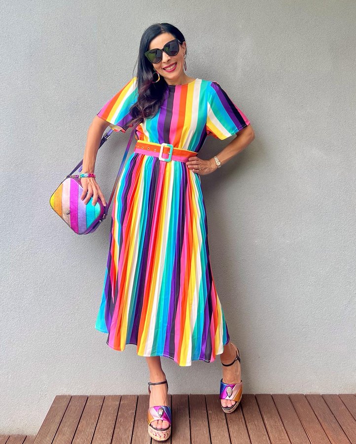 Instagram post by an influencer for Little Party Dress. Caption reads: [...] Dress in Kelly Stripe:* @littlepartydress x....