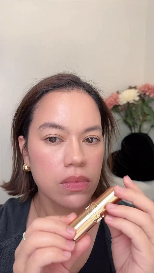 Instagram post by an influencer for YSL Beauty. Caption reads: [...] Oil Gloss in Honey Moon from YSL Beauty’s....