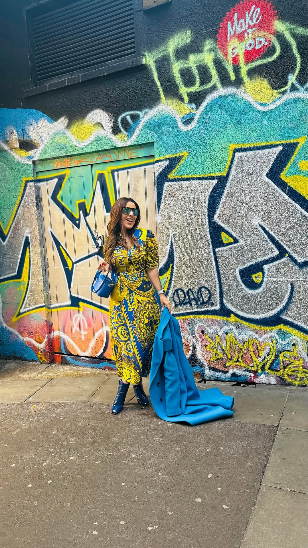 Instagram post by @fernandapaulaandrade for Karen Millen. Caption reads: 🇬🇧No one can dim the light of someone born to....