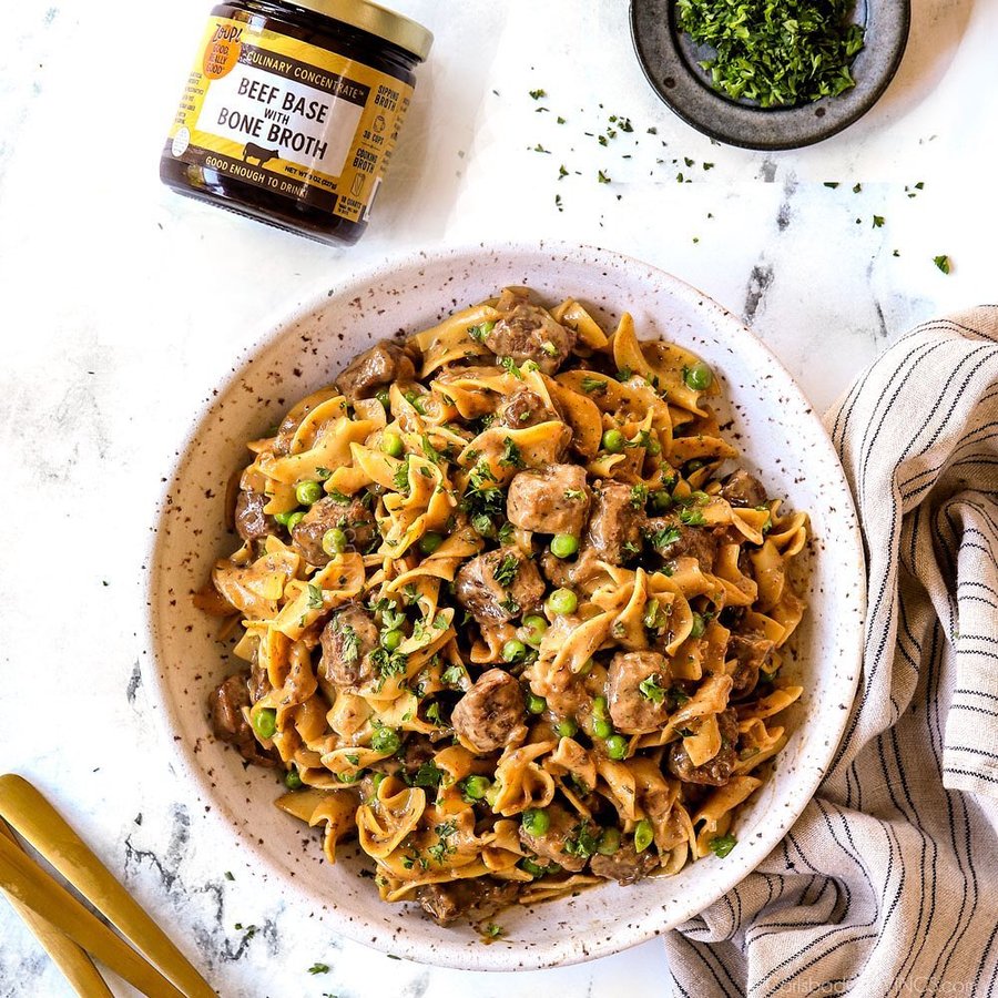 Instagram post by @carlsbadcravings for The Kitchn. Caption reads: #ad This Beef and Noodles recipe is mega....