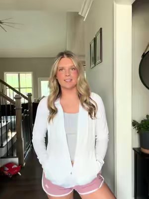 TikTok post by @kaitlynhsmith for MAGCOMSEN. Caption reads: [...] outfit just makes it so much better!....