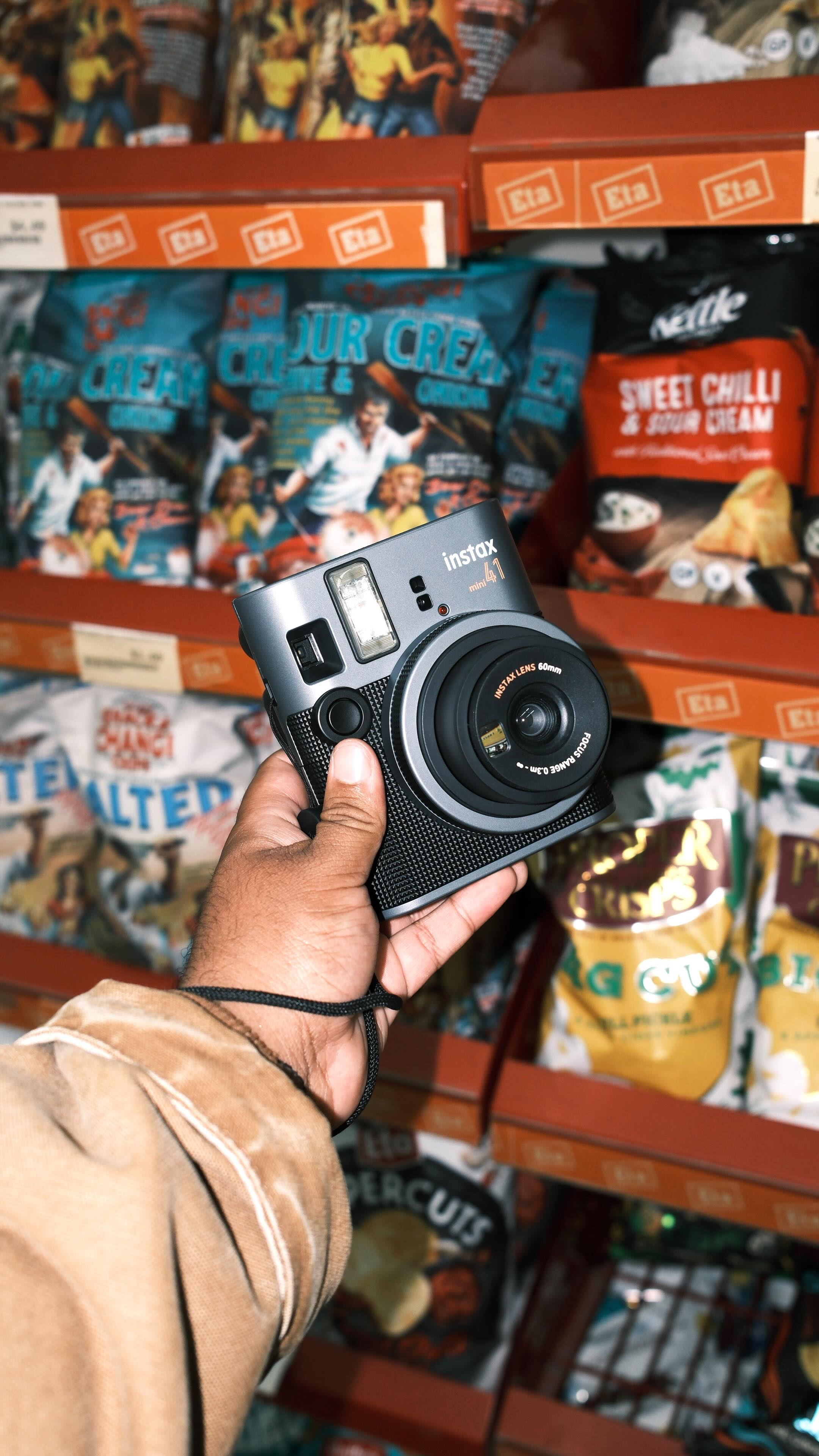 Instagram post by @samuelbernardd for Instax. Caption reads: The Instax Mini 41 is the perfect tool to develop....