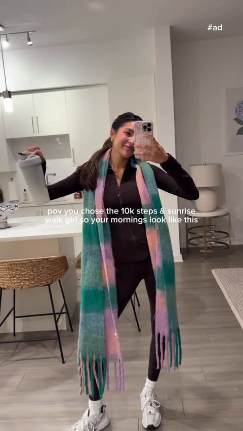 Instagram post by @megan_bair for BlenderBottle. Caption reads: #ad morning walk with @blenderbottle !!! now....