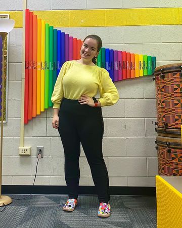 Instagram post by @thechromaticmusicteacher for UIN Footwear. Caption reads: #ad These shoes from @uinfootwear are SO BRIGHT....
