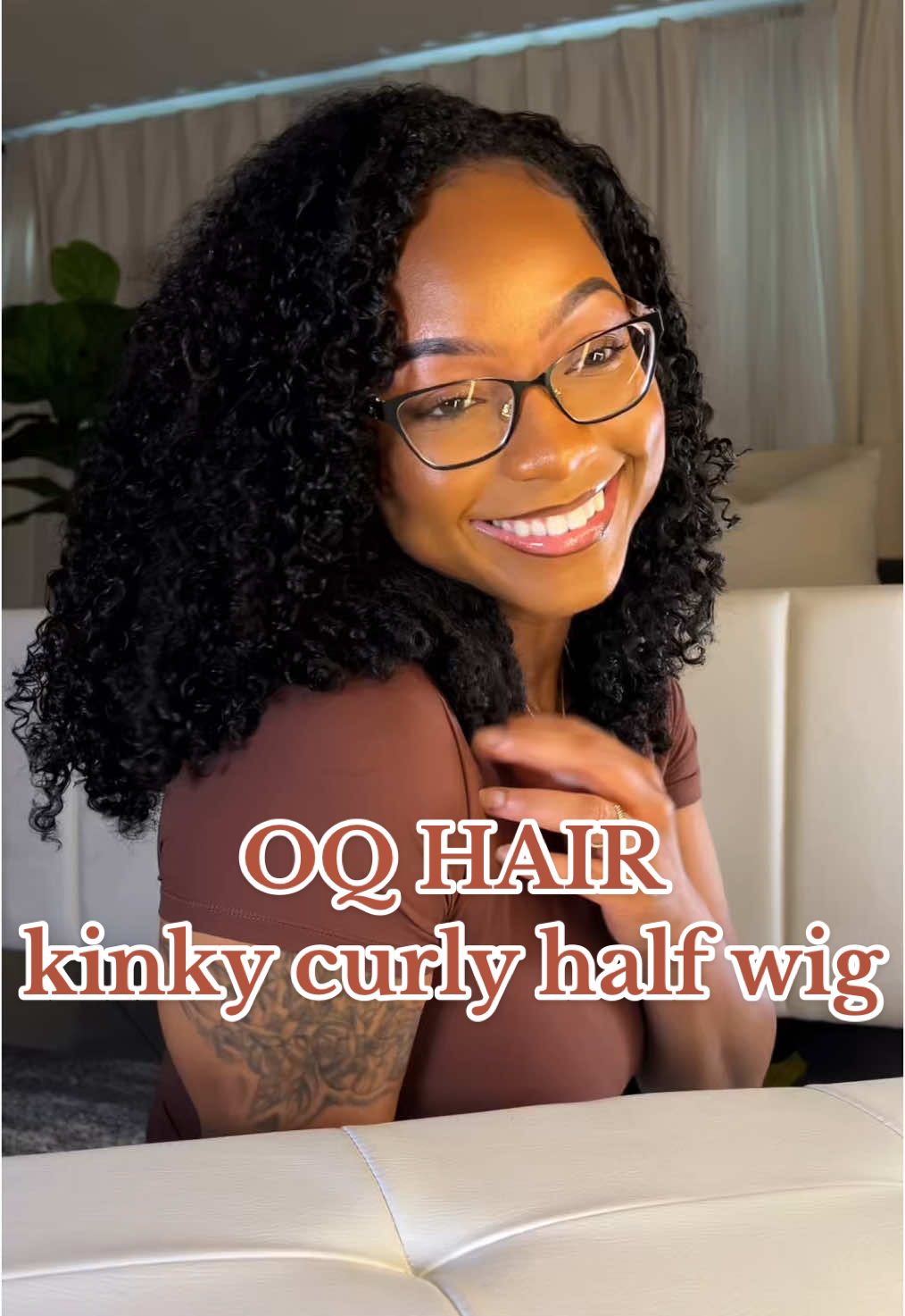 TikTok post by @aisatacapri for OQHAIR. Caption reads: Kinky Curly Half Wig in 20 inches @OQHAIR....