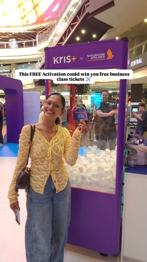 Instagram post by @momentswithkhush for Singapore Airlines. Caption reads: [...] promo code for $380 off your next Singapore....