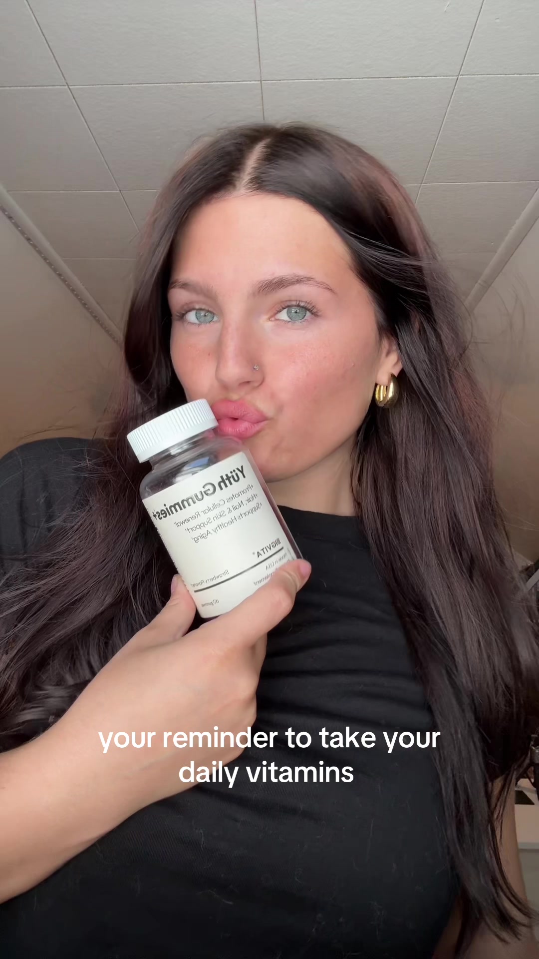 TikTok post by @adrianaschreffler for BIGVITA. Caption reads: @BIGVITA - Health #wellness #vitamins #glow [...].