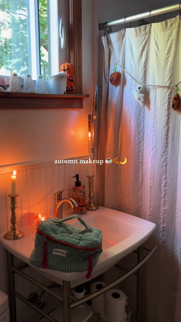 TikTok post by @anniemathilda for Rhode. Caption reads: [...] essentials 🍂☕️🌙🌲 @Saie @Glossier @RHODE....