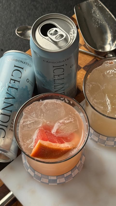 Instagram post by @colettescocktails for Icelandic Glacial. Caption reads: [...] your sparkling water 🍊🍯🌶️🧊....