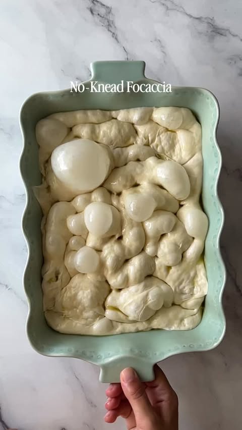 Instagram post by @figs_and_olivess for The Feedfeed. Caption reads: This No-Knead Focaccia by @figs_and_olivess is the....