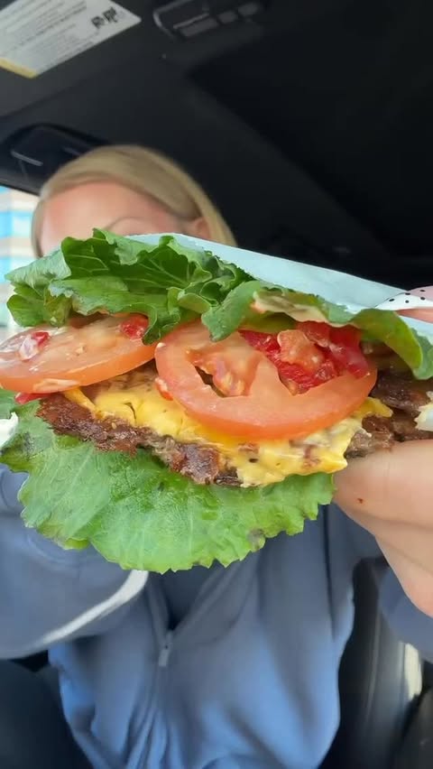 Instagram post by @smaller_sam.pcos for Shake Shack. Caption reads: Shake Shack🍔🥤(330 cals + 23g protein) Here’s how....