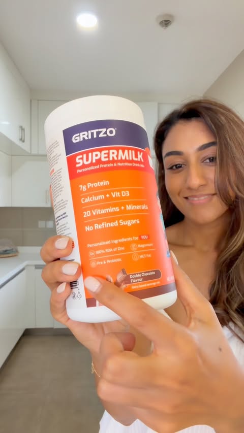 Instagram post by @gunjanprehar for GRITZO. Caption reads: [...] nutrition in every serving. 💛 Added Gritzo....