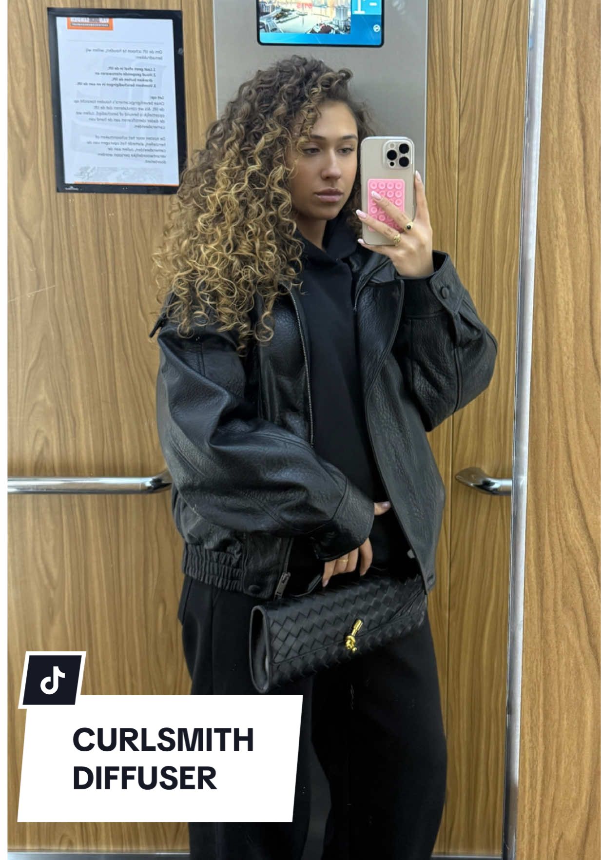 TikTok post by @bylesleyamsterdam for CURLSMITH. Caption reads: AD @Curlsmith Defrizzion Dryer & XXL Diffuser....