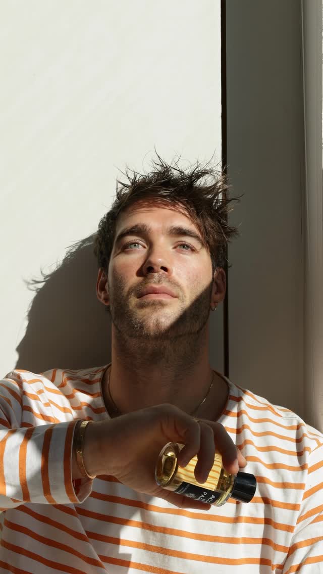 Instagram post by @janis_danner for Acqua di Parma. Caption reads: Embracing autumn’s sun-kissed moments with the new....