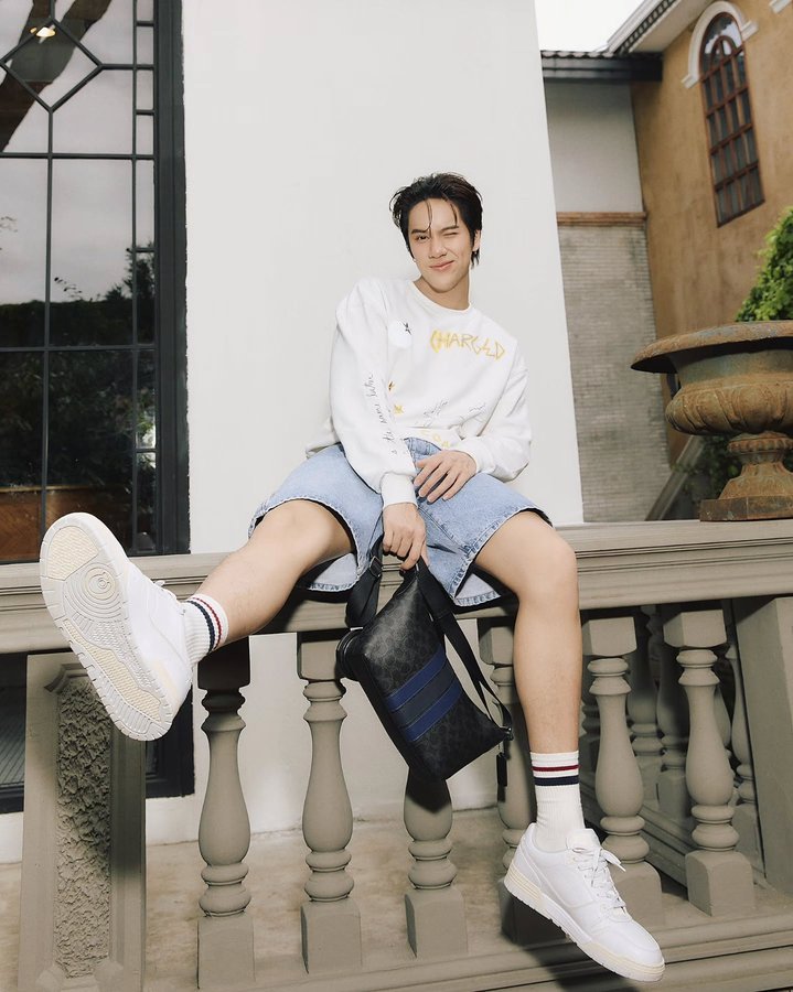 Instagram post by @nanon_korapat for Coach. Caption reads: sneakers on. @coach #CoachNY.